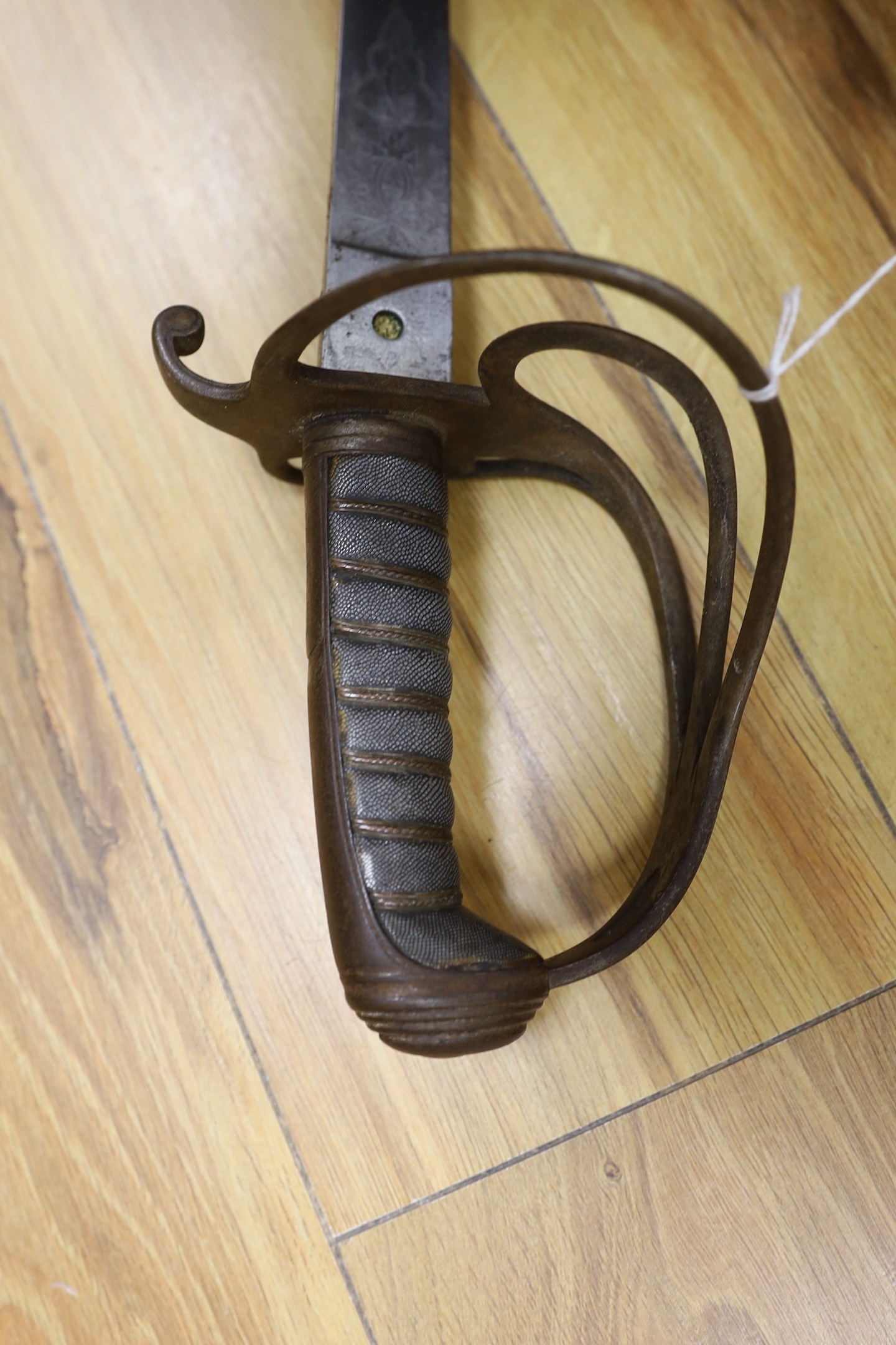 An 1821 light cavalry sabre by Andrews, 107 cms long.